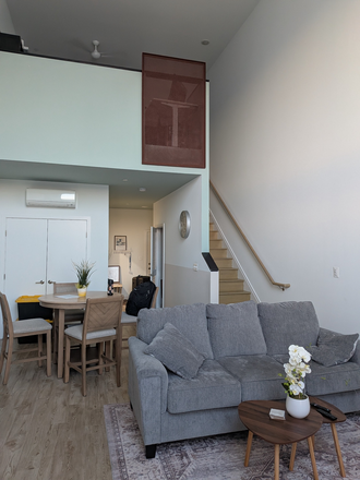 Living Room - Fully furnished Loft in Harbor East, Baltimore for $2500/month (July to September)!
