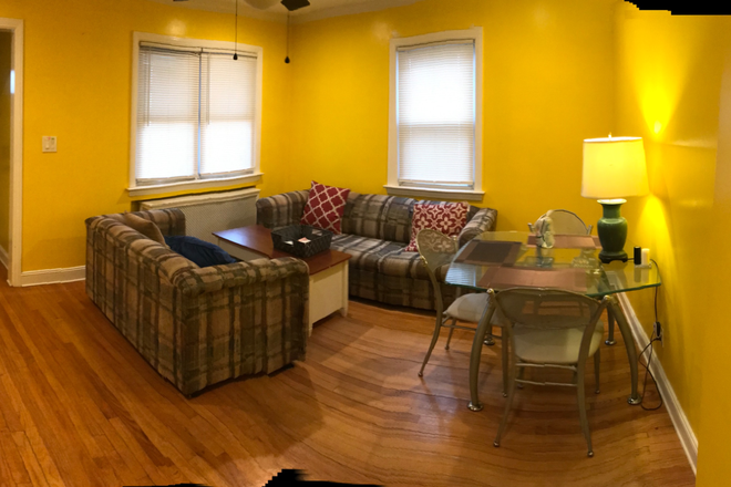 Living room - ONE BEDROOM AVAILABLE. NEAR ADELPHI. GARDEN CITY S. FEMALE STUDENT PREFERRED. NO FEE