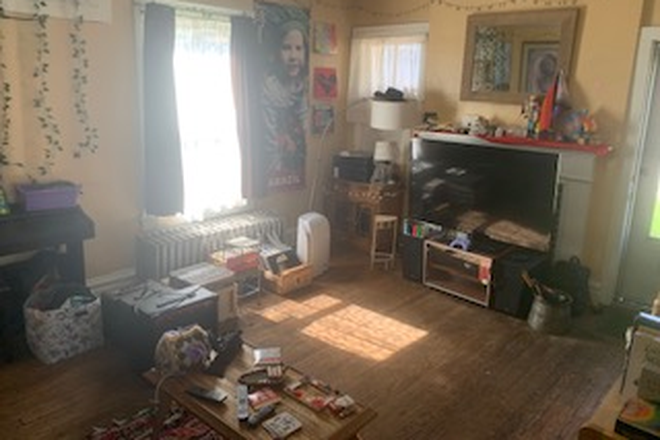 Living room - Duplex house with one 3-bedroom apartment ($1575/month). One block from campus.