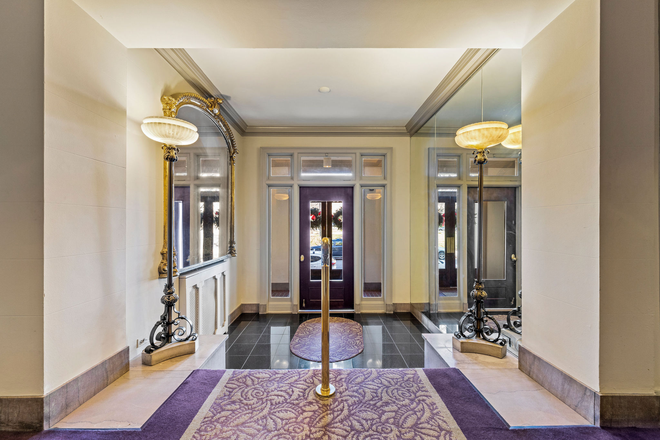 Foyer to building - Fab2 BR+ den, 2 BA condo; Historic bldg steps from Homewood Campus,