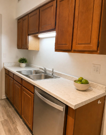 remodeled kitchen sink and counter - Top floor & corner private unit w/ elevator, natural light, pool, walkin closet, new appliances