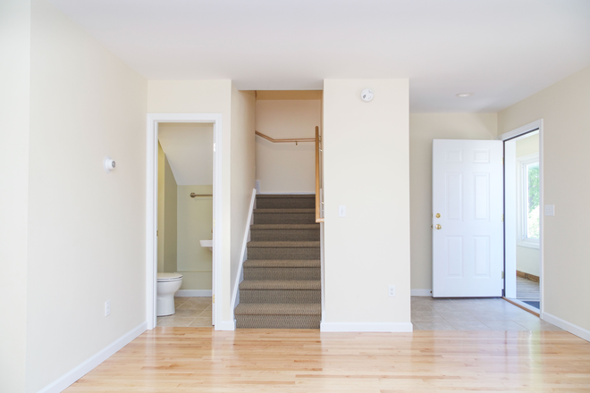 Living area/front entrance - Champlain industries, apartment close to campus and DT Burlington