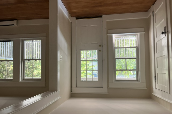 entrance to porch area - Convenient to UMass but quiet & less expensive, 2 bdrm filled w/ sunlight, natural beauty, 2 porches