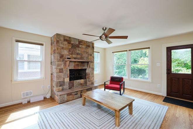 . - Gorgeous Brookland home with a gourmet kitchen, enormous backyard with patio, and fireplace