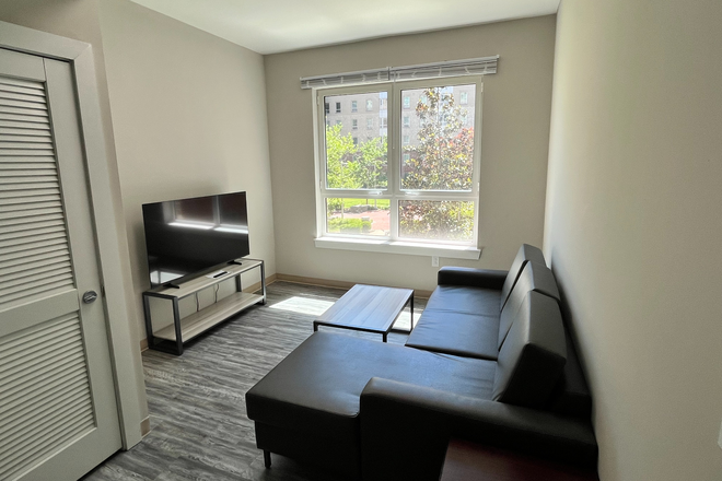 Living Room with Internet Ready TV - Valentine Commons 2x2 unit 1 room available immediately parking included