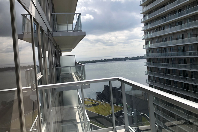 Balcony - Fully furnished condo, except for 1 bedroom (your room). 2 bed 2 bath. Looking for male room