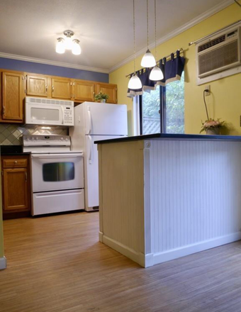 kitchen from living room view - OPEN HOUSE SATURDAY AUGUST 8, 2025 11:30-1:00 The Brook Townhouses - GREAT ONE BEDROOM