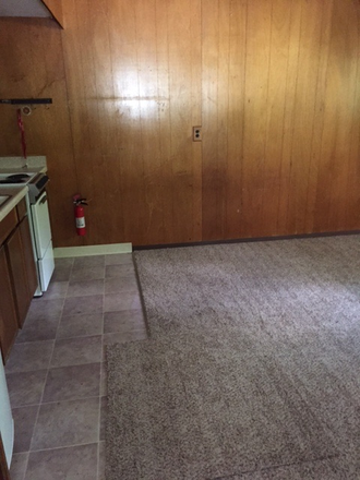 empty living space photo - 1 Bedroom 1 BA side by side duplex in quiet neighborhood Duplex