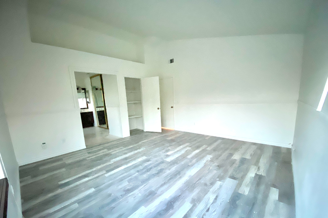 Spacious master bedroom with big linen closet - 1 Master Bedroom and 3 Individual Bedrooms in a Renovated 4/2 House in a Nice Neighborhood