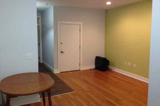 living area - 2 bedroom Apt. with large deck and extra study room 2 Blocks from Campus