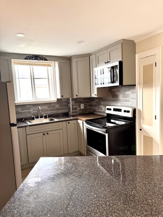 kitchen - one bedroom just over East Side line in Oak Hill Pawtucket heat and hot water inc Apartments