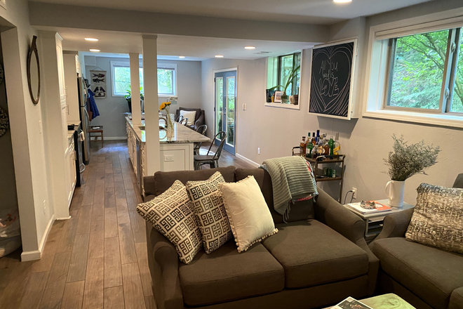 Living Room and Kitchen showing entrance to apartment - Terrace Level Apartment close to campus