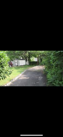 Back - Rooms for rent- utilities/laundry/parking  included. Call / text to tour House