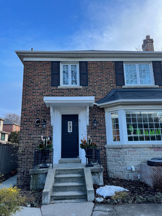 Outside street view of front of the home. - Bright 2 Bedroom Lower Level Unit on quiet, leafy street in Upper Forest Hill