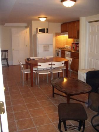 living room/kitchen - 179 Prospect St Apartments