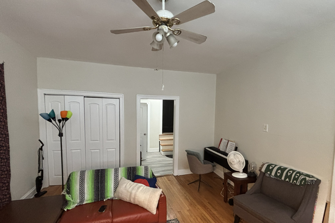 Living room alternate angle - Storage closet and piano (for any musicians) - 2 Bed 1 Bath Garden Apartment in Wrigleyville / Lakeview Area