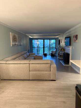Open concept living room - Modern 2BR/2BA Condo in Prime Buckhead Location