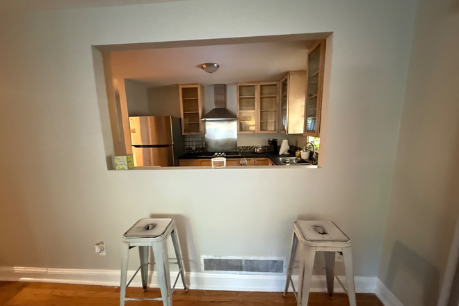 Kitchen window to living room - Cozy Furnished Home just off North Decatur Road, Close to Campus