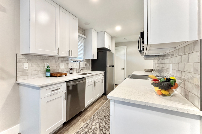 kitchen (staged photo, does not come furnished) - Brand New Remodeled 2 bedroom/2 Bathroom - 4885 Eisenhower Drive Apartments