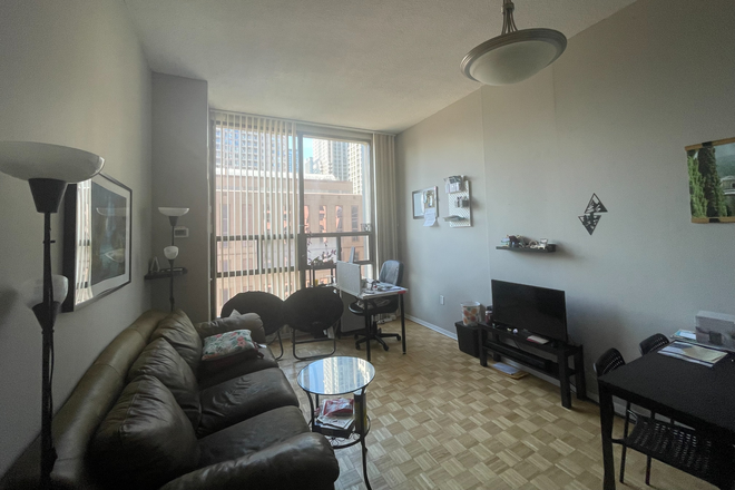 Living Room - Furnished Apartment (1 Bedroom) with Laundry in Discovery District