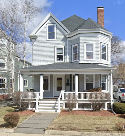 Front of house - 4 bedrooms and flexible living space with fenced in yard & parking