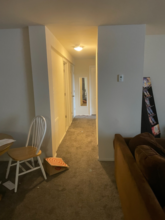 Hallway. Left door is shared bathroom. Two bedrooms around the corner - Kenilworth Apartments