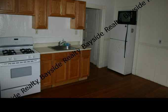 kitchen - No Fee! spacious studio with porch, heated, laundry on site Apartments