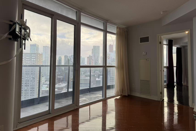 Living Room - 1Bedroom + Den Stunning South East View-City & Lake