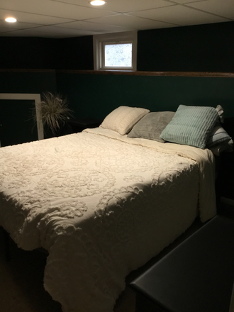 Bedroom with tv - Basement apartment with kitchen full bathroom a bedroom and living room