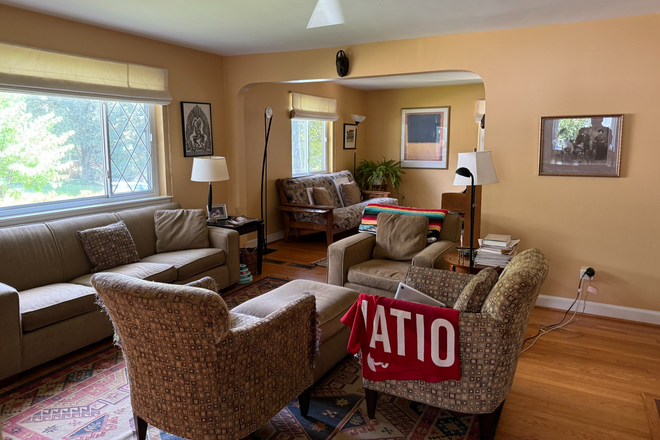 Living room, with piano and fireplace - House Share in North Bethesda