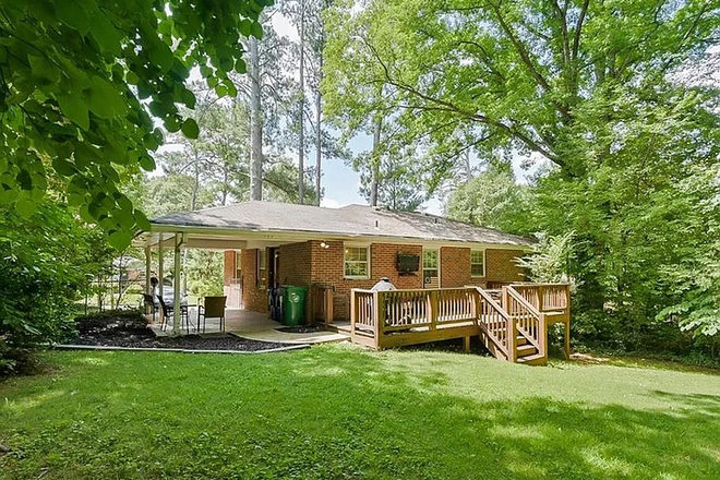 Back yard with grill! - 3BR home with fenced backyard in Decatur!