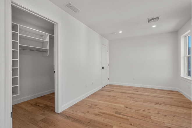 Bedroom with large closet and shared bath - Private Room Avail 1/15/24 in oversized 3 Bedroom Condo near Ball Station/Tufts