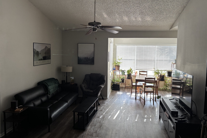 Living room and dining room - 2x2 Available at Solis in Goldenrod Apartments