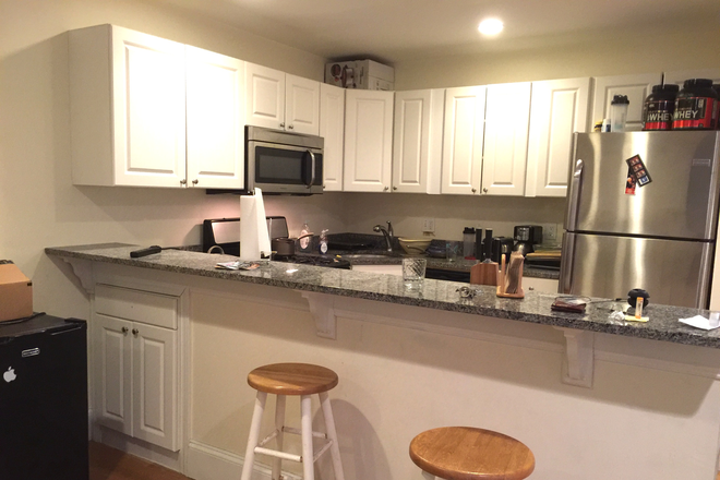 Visit hubrealtyproperties.com - Fantastic 3 bedroom with breakfast bar and large bedrooms, next to green line T Condo