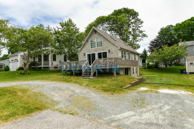 front - Spacious living area with deck in Narragansett