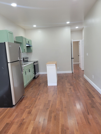 View from living area to kitchen - Rosewood Apartment - Unit 1