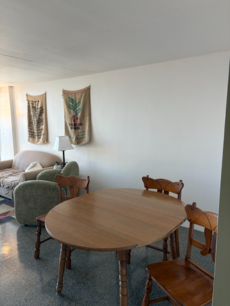 Living Room - Table - Peabody Terrace Tower (HUH) Apartments