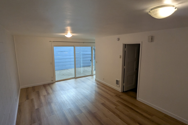 Living Room - Charming 1-Bedroom 1-Bath Apartment with patio/deck in Prime Location