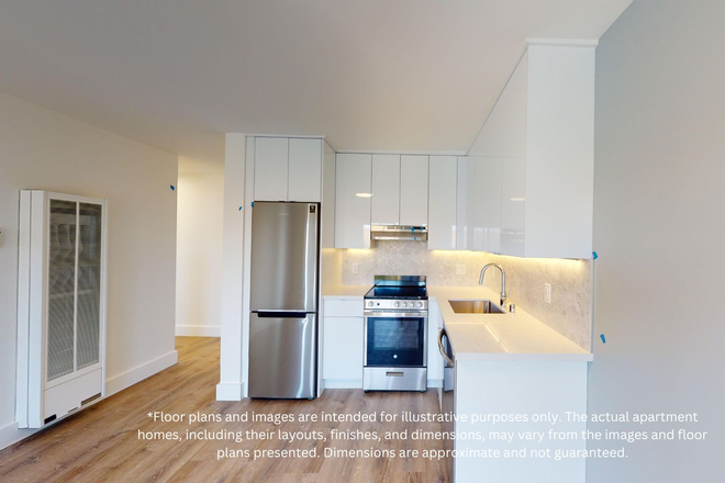 Kitchen with multiple cabinets, refrigerator, stove, range hood, and sink - 2252 Parker Apartments