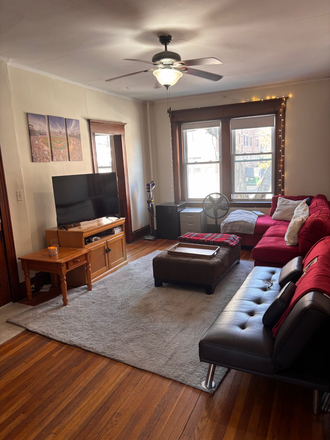 Living Room - 3 Bed, 1 Bath. Close to BC Law and Main campus bus stops. ~5min walk of B,C,D Green line stop Apartments
