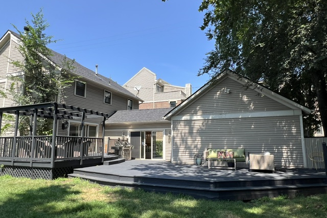 Large deck with multiple areas for sitting/dining - Beautiful Home To Share