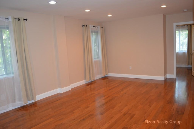 Living Room - Available 2025!  This Spacious 3 bed/1.5 Near BC Shuttle! Great location for Boston College Apartments