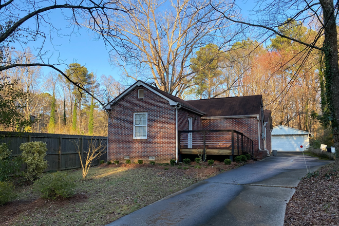 Brick Exterior ..property is fenced - Brick Home with fence & double garage ...Tanner Drive near Decatur, Scottdale, Perimeter