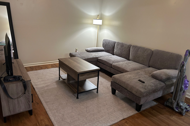 Living room, with couch! - Stone Creek Apartments