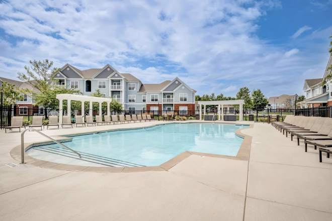 Communal Pool/BBQ Area - Lodge on the Trail Apartments
