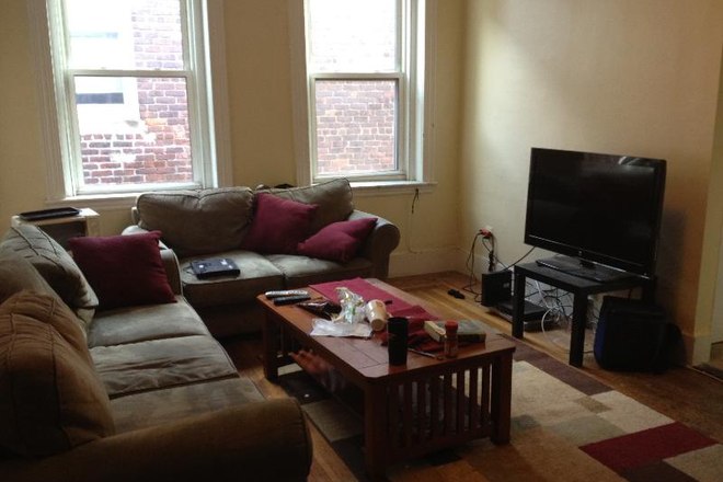 Visit hubrealtyproperties.com - Mission Hill, Spacious 4 bedroom with updated kitchen and porch, on T