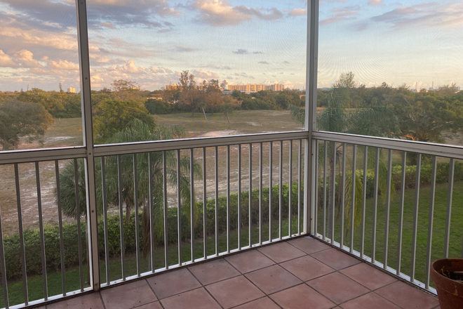 balcony - East Boca Raton bike ride to campus