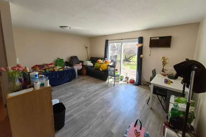 Living room - The brook for sublease Townhome