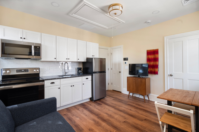 Studio Kitchen - Charming Furnished Studio Apartment in the Wayland Neighborhood