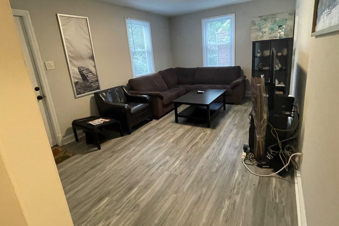 49th: Living Room - Gorgeous bedrooms on 49th Pl near UMD campus! Cleaning service provided! House